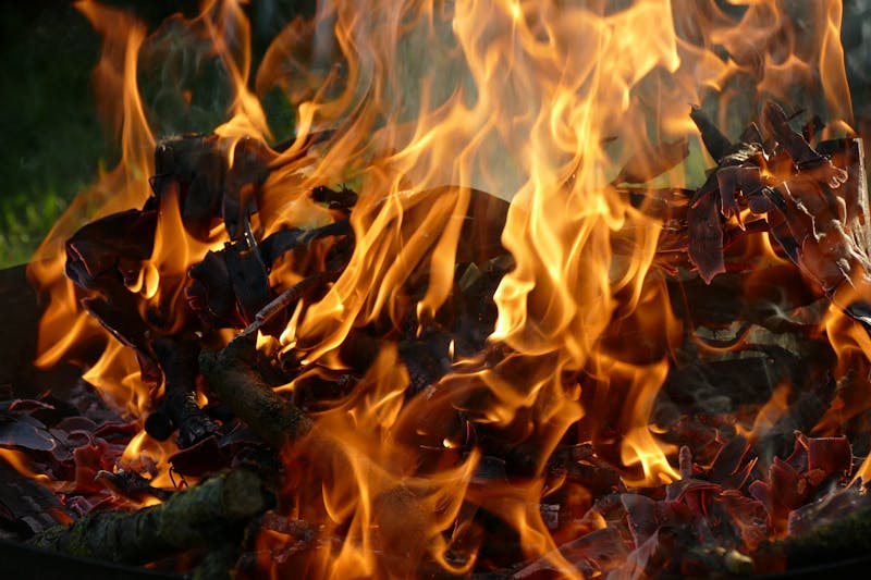 Authentic wood-fired oven burning with flames